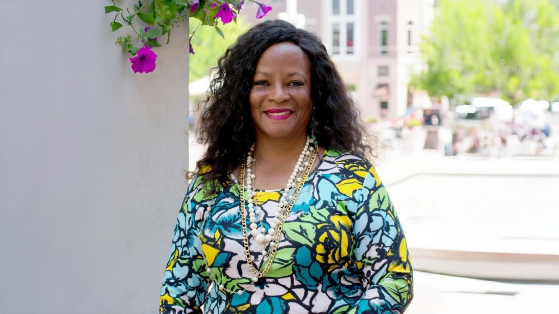 Feature photo of Dr. Marie Holliday outside in downtown Fort Worth, Texas.