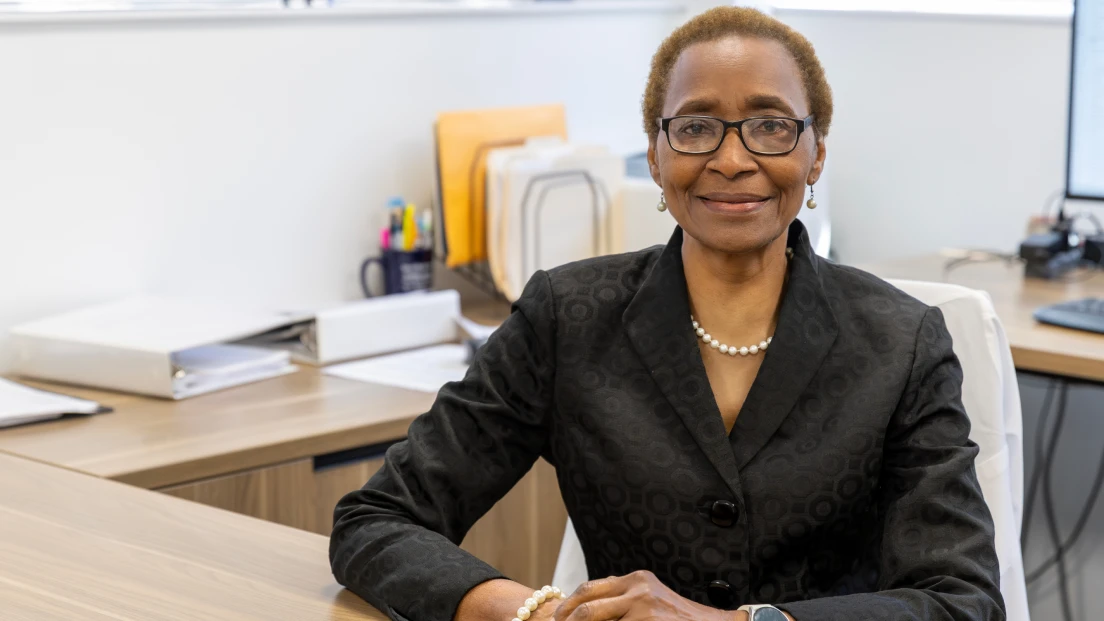Dental educator Dr. Ernestine Lacy, sitting in her office.